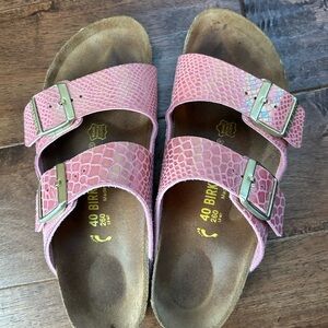 Shiny Pink Birkenstocks with gold buckles